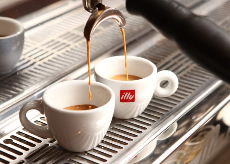 Espresso being pulled from an espresso machine