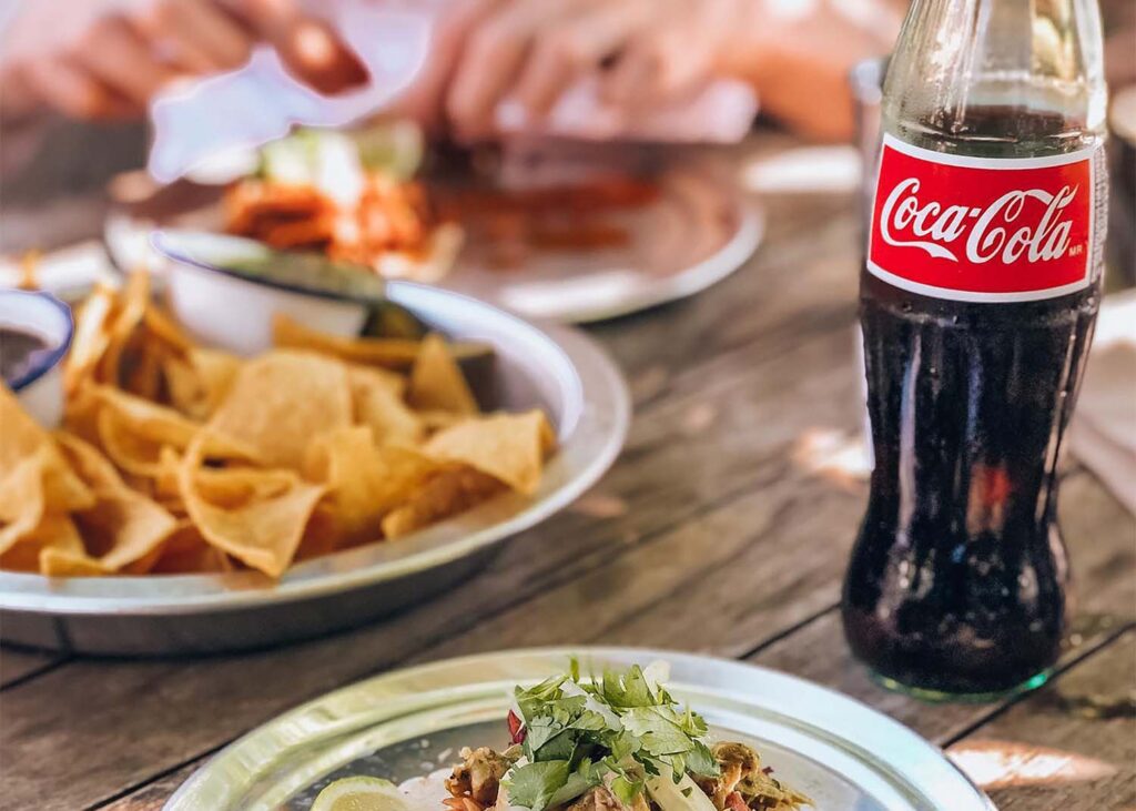 Coffee Vs Coke: A Comprehensive Comparison (2024) 3 Mexican Coke Bottle And Nachos