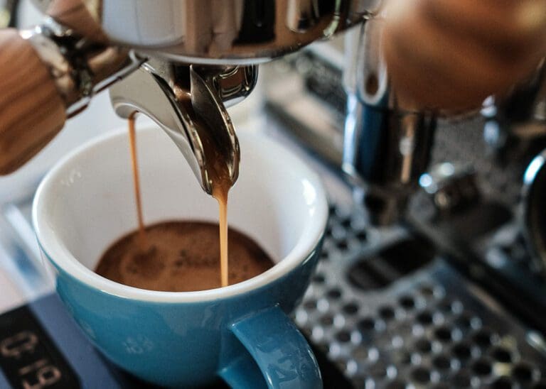 Espresso being pulled for a Cafe Noisette