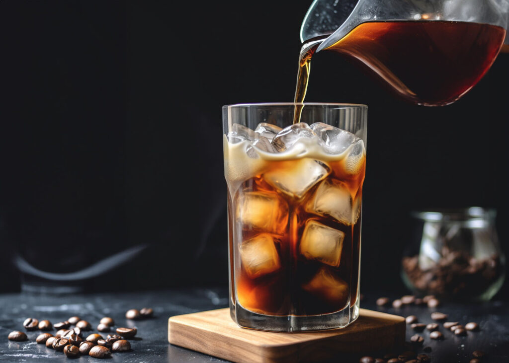 Cold Brew Vs Iced Coffee Vs Iced Americano: A Comprehensive Comparison 6 Pouring Iced Coffee Into A Glass