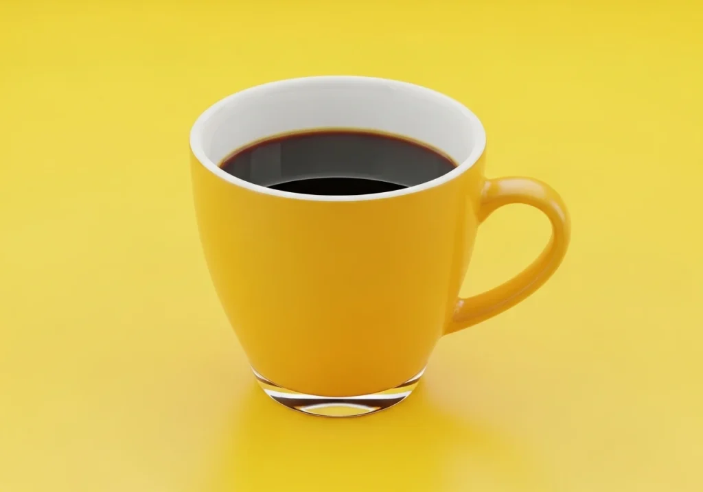 Does Coffee Make Your Pee Yellow? What Your Urine Color Says About Your Health 4 Black Coffee In A Yellow Mug On Yellow Background